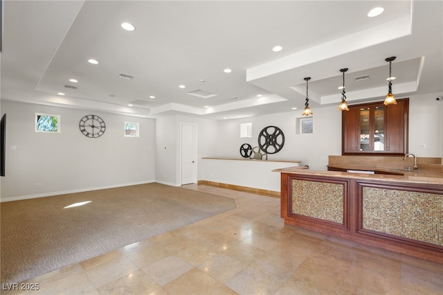 welcome area featuring visible vents and a sink