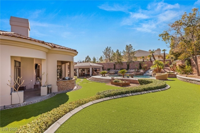 view of yard featuring a fenced in pool, a fenced backyard, and a patio