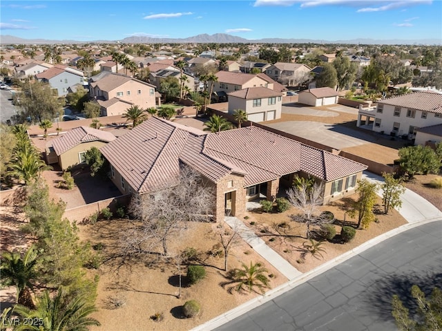 bird's eye view featuring a residential view and a mountain view