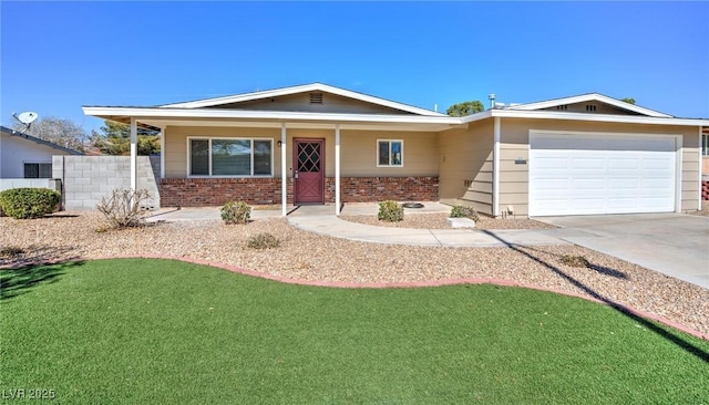 single story home with driveway, brick siding, an attached garage, and a front yard