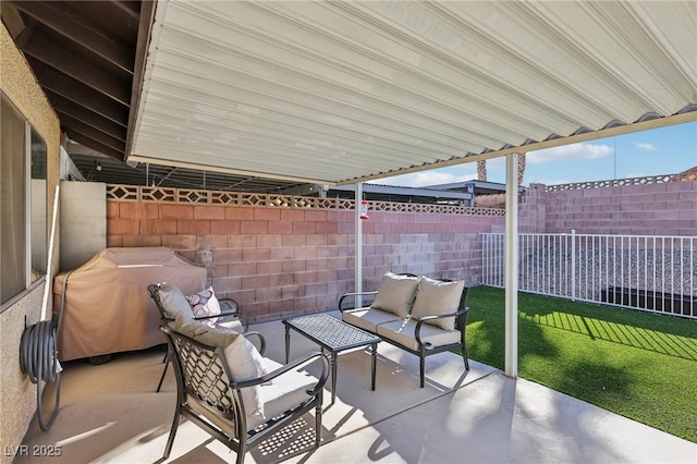 view of patio / terrace featuring a fenced backyard, an outdoor hangout area, and grilling area