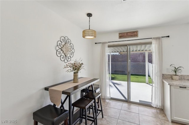 dining room with light tile patterned floors