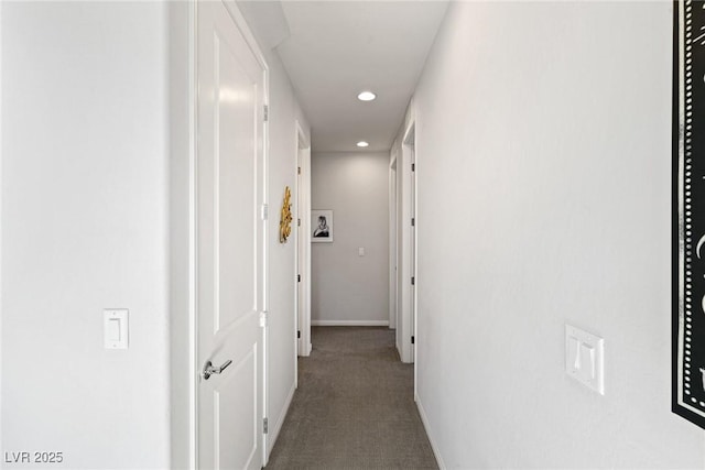 hall featuring carpet floors, baseboards, and recessed lighting