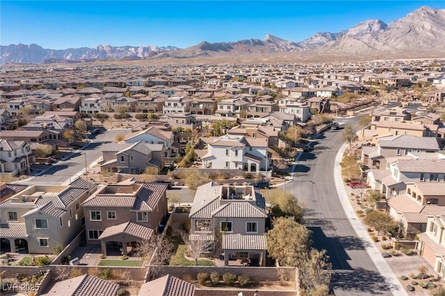 bird's eye view with a residential view and a mountain view