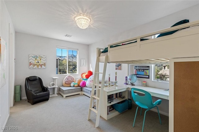 bedroom featuring visible vents and light colored carpet