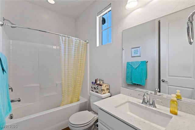 bathroom with toilet, shower / bath combo, and vanity