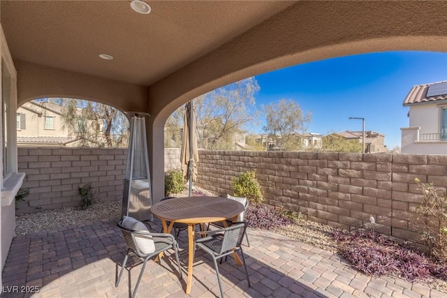 view of patio / terrace featuring a fenced backyard and outdoor dining area