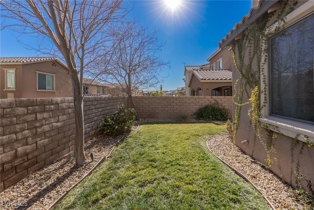 view of yard featuring a fenced backyard