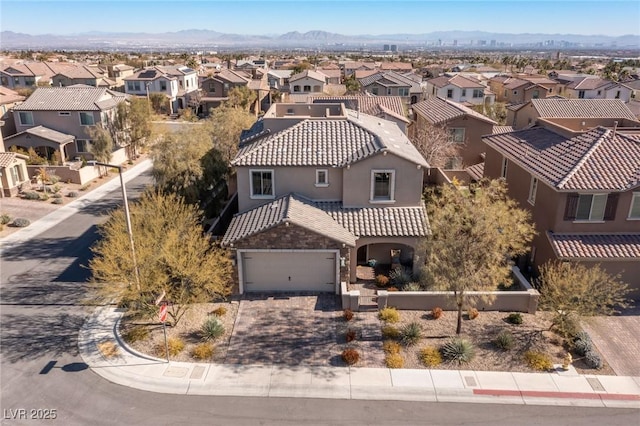 aerial view with a residential view and a mountain view