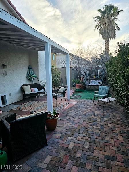 view of patio with fence