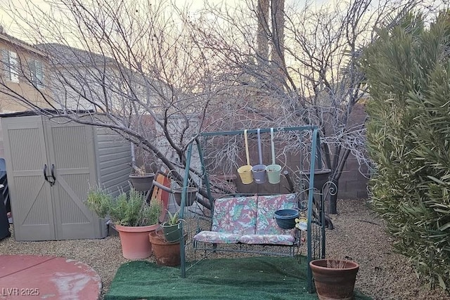 view of yard with a shed and an outdoor structure