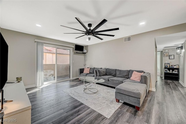 living room with recessed lighting, visible vents, ceiling fan, wood finished floors, and baseboards