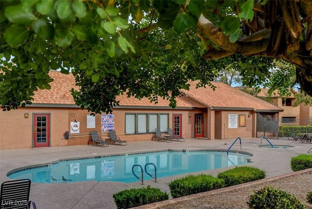 2451 N Rainbow Blvd Unit 2076, Las Vegas, NV 89108 - community pool featuring a patio area