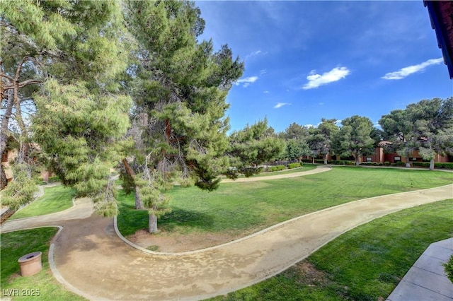 2451 N Rainbow Blvd Unit 2076, Las Vegas, NV 89108 - view of home's community featuring a yard and view of wooded area