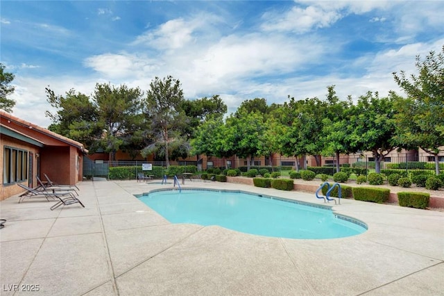 2451 N Rainbow Blvd Unit 2076, Las Vegas, NV 89108 - community pool featuring a patio