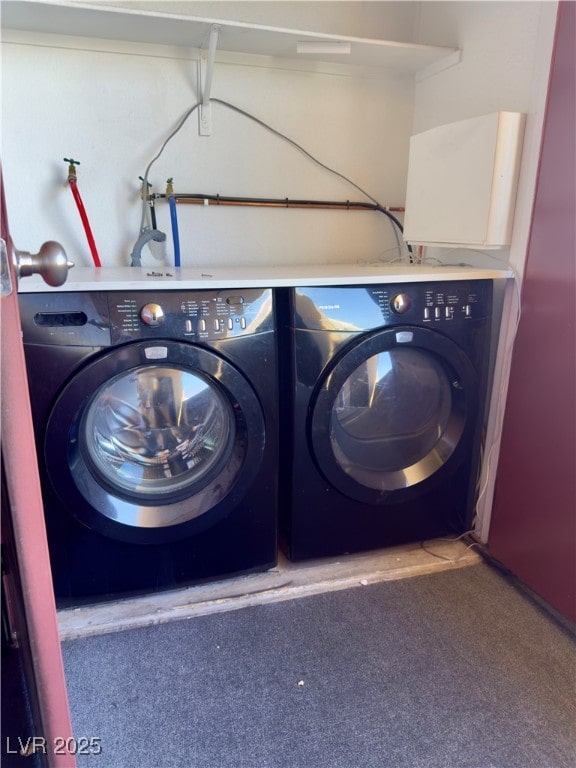 2451 N Rainbow Blvd Unit 2076, Las Vegas, NV 89108 - washroom featuring washing machine and dryer and carpet floors