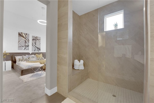 full bathroom featuring walk in shower and tile patterned floors