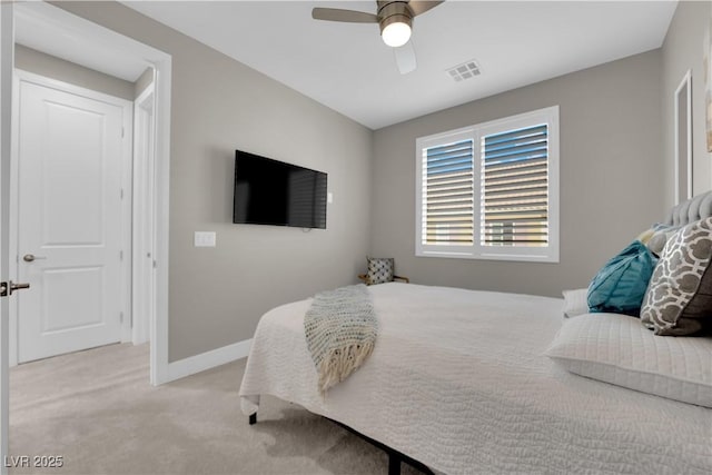 bedroom with light carpet, baseboards, visible vents, and ceiling fan