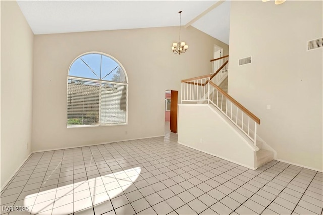 interior space with beam ceiling, visible vents, a notable chandelier, and stairs