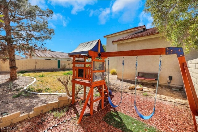 view of playground with fence