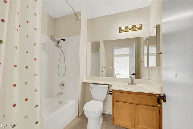 full bath featuring tub / shower combination, vanity, toilet, and tile patterned floors