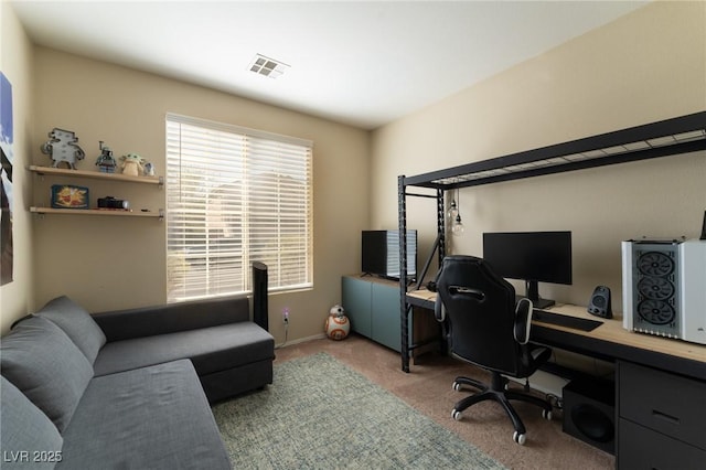 home office featuring carpet floors and visible vents