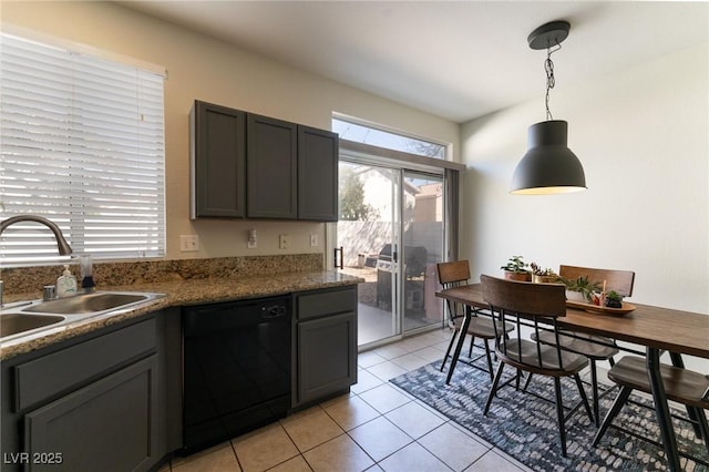 kitchen featuring light tile patterned floors, dishwasher, decorative light fixtures, gray cabinetry, and a sink