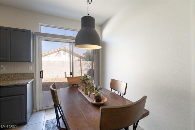 dining room featuring light tile patterned floors