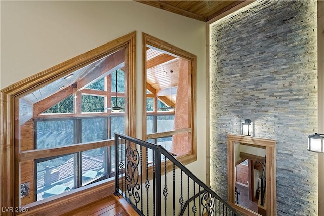 interior space featuring wood finished floors and crown molding