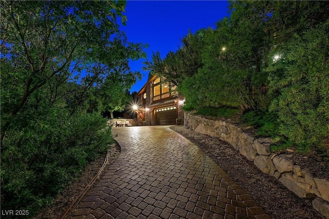 view of front facade with decorative driveway