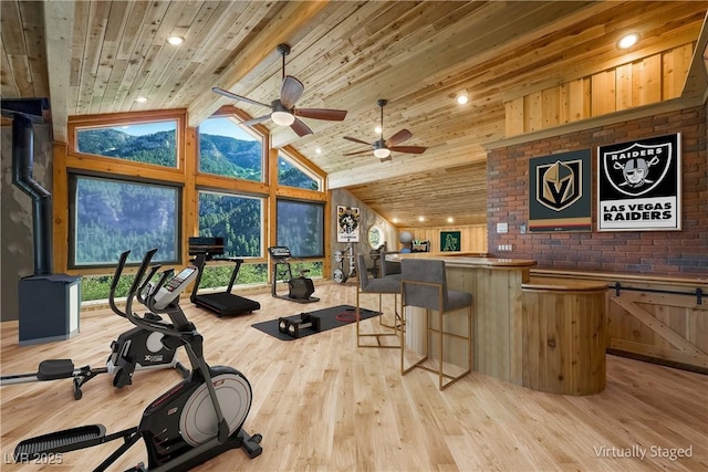 interior space with light wood finished floors, wood ceiling, high vaulted ceiling, and recessed lighting