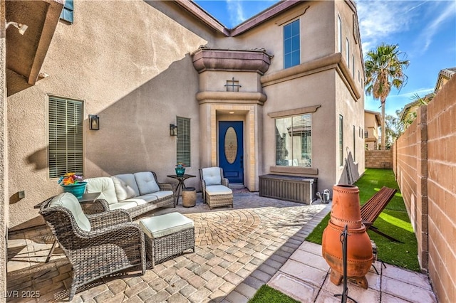 view of patio / terrace featuring a fenced backyard and an outdoor hangout area