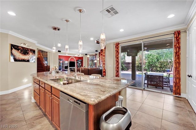 kitchen featuring dishwasher, visible vents, a kitchen island with sink, and pendant lighting