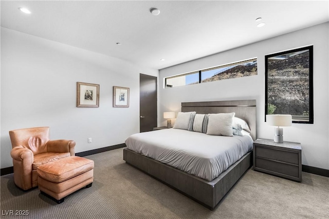 carpeted bedroom featuring recessed lighting and baseboards