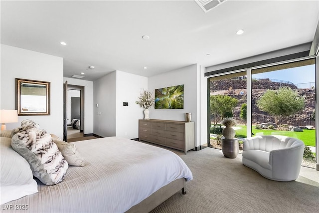 bedroom featuring recessed lighting, visible vents, and light colored carpet