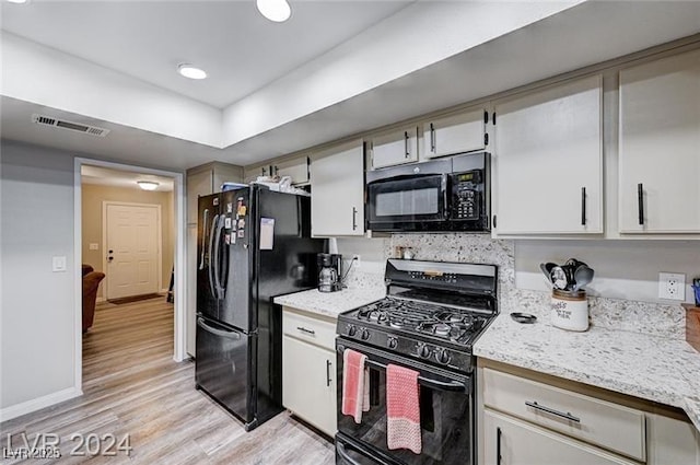 478 Potomac St, Henderson, NV 89015 - kitchen featuring black appliances, light wood finished floors, visible vents, and baseboards