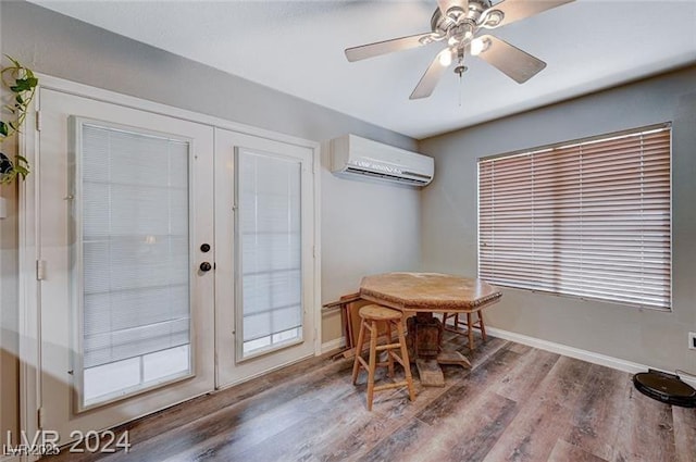 478 Potomac St, Henderson, NV 89015 - dining space with a wall unit AC, a ceiling fan, baseboards, and wood finished floors
