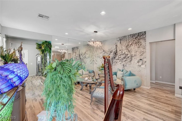 dining room with visible vents, a chandelier, wood finished floors, and recessed lighting