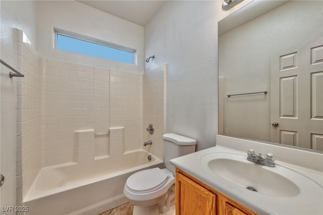 bathroom with toilet,  shower combination, vanity, and tile patterned floors