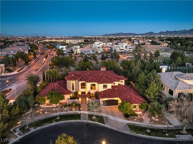 birds eye view of property featuring a residential view and a mountain view