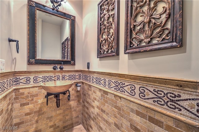 bathroom featuring wainscoting