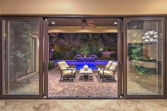 view of patio featuring a ceiling fan