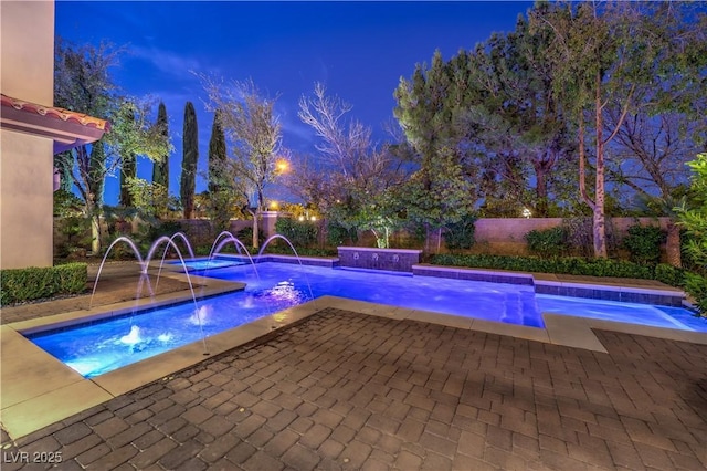 view of swimming pool with a fenced backyard and a fenced in pool