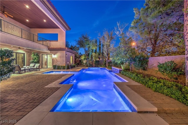 view of pool featuring a fenced in pool, fence, and a patio