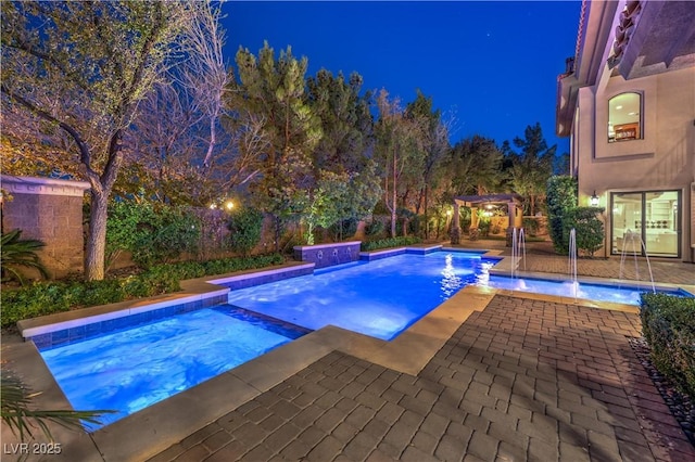 pool at night with fence private yard, a pergola, and a fenced in pool