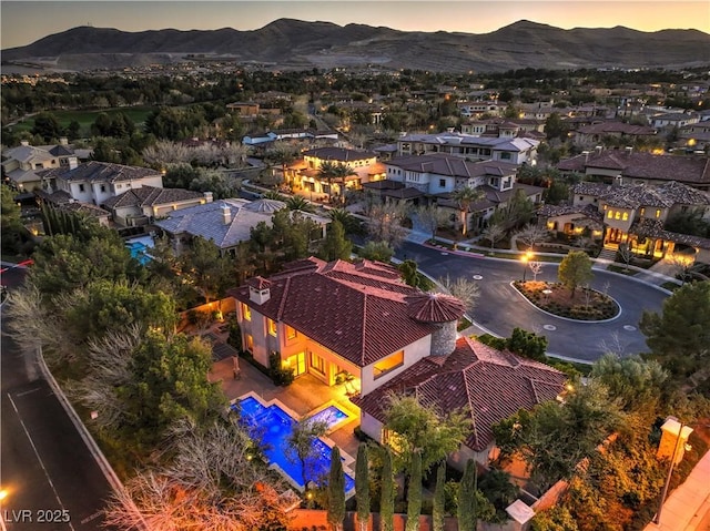 aerial view featuring a residential view and a mountain view