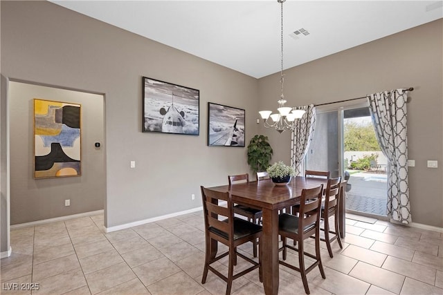 dining area with visible vents, a notable chandelier, baseboards, and light tile patterned floors