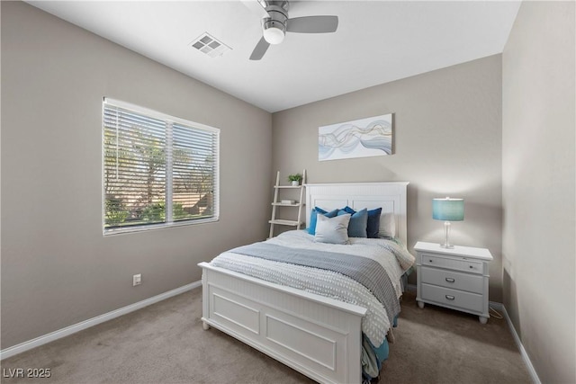 bedroom featuring light carpet, a ceiling fan, visible vents, and baseboards