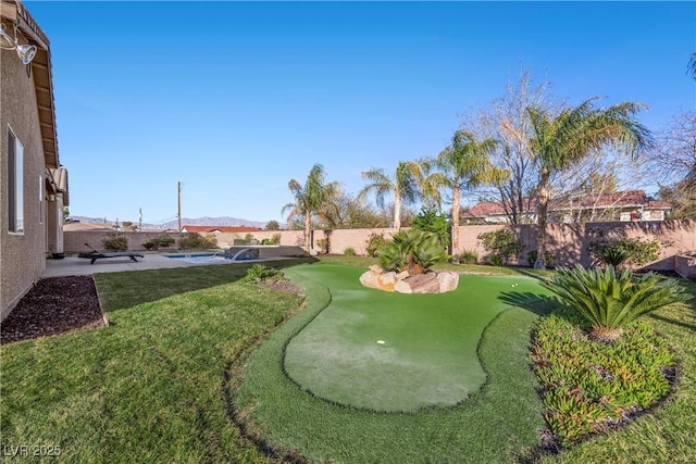 view of yard featuring a fenced backyard and a fenced in pool