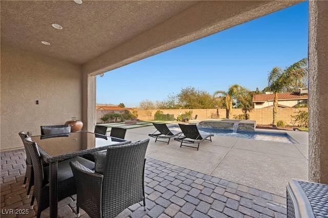 view of patio / terrace with a fenced backyard and a fenced in pool